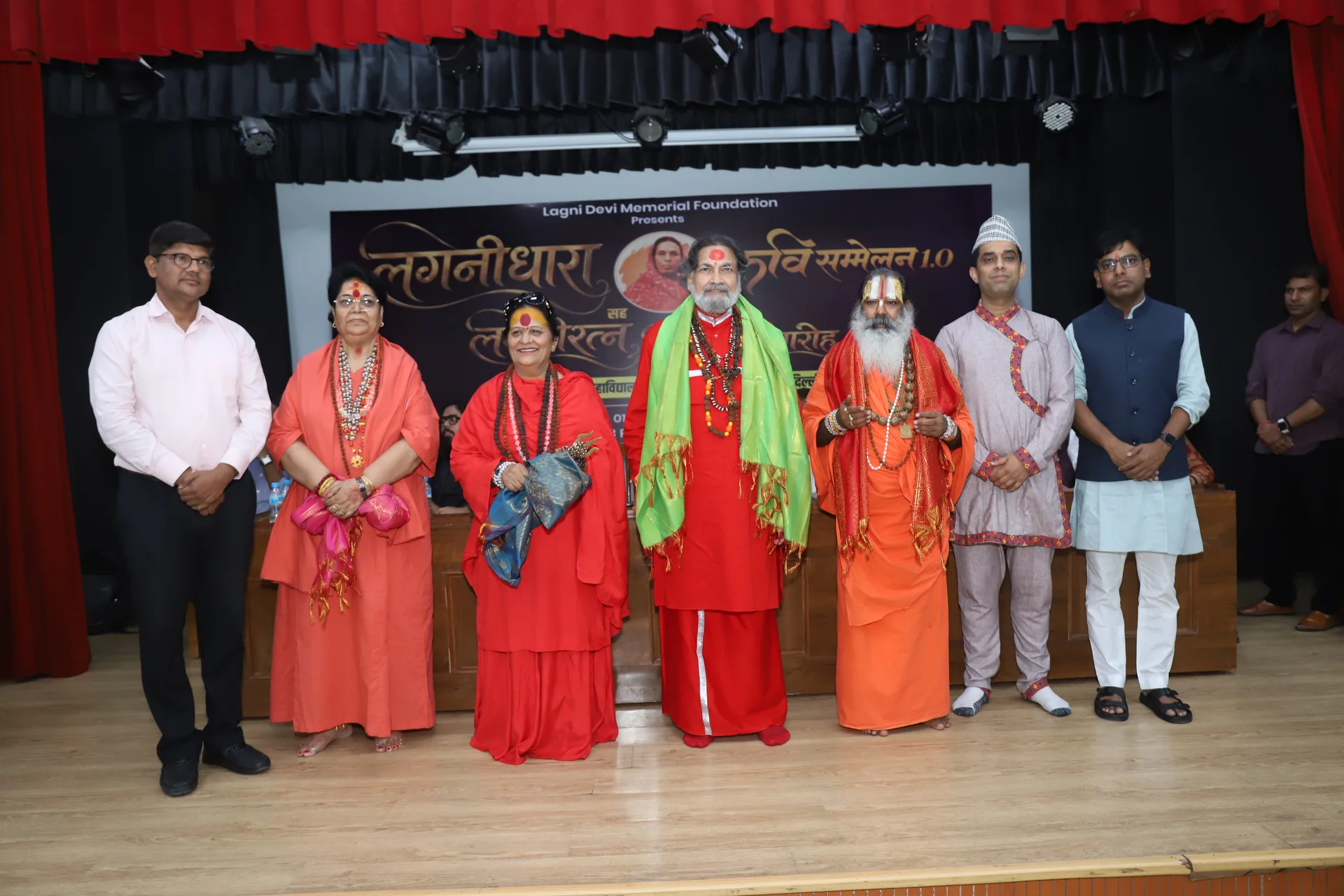 Honoured saints and trustees on stage